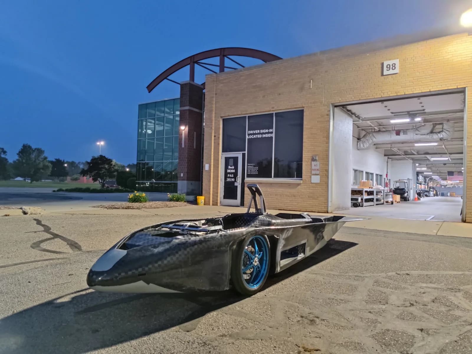 University of Michigan solar car Astrum outside a workshop