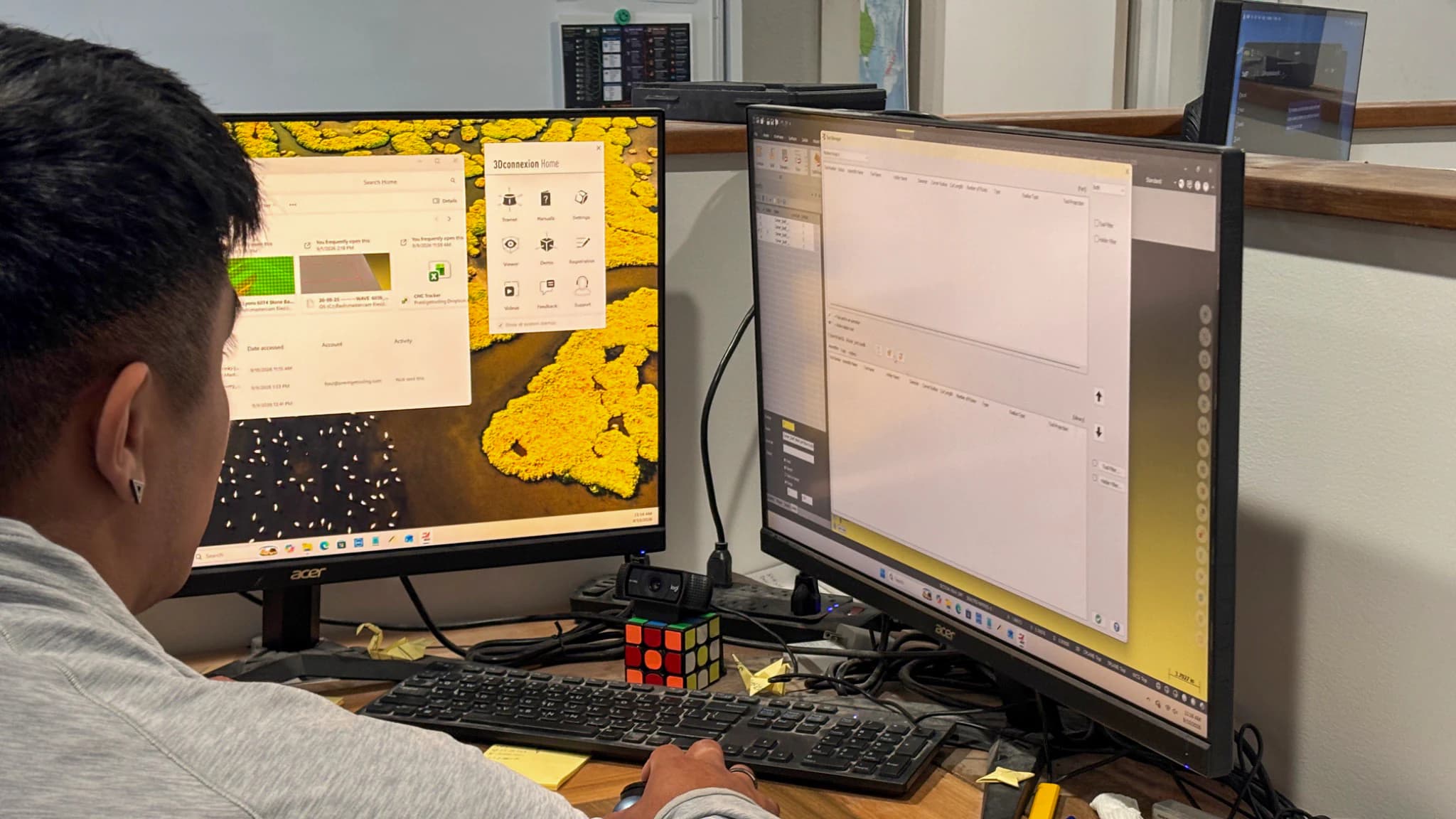 Raul working at a dual-monitor engineering workstation at Prestige Tooling