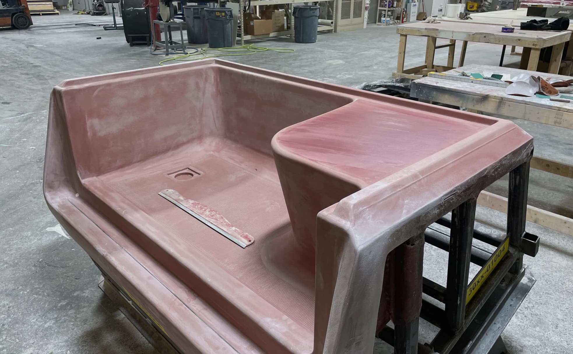 Large pink thermoforming tool in the Prestige shop